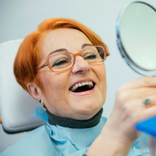 Dentures patient in Lacey smiling